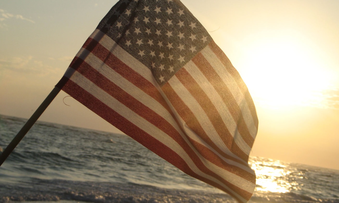 American flag beach sunset
